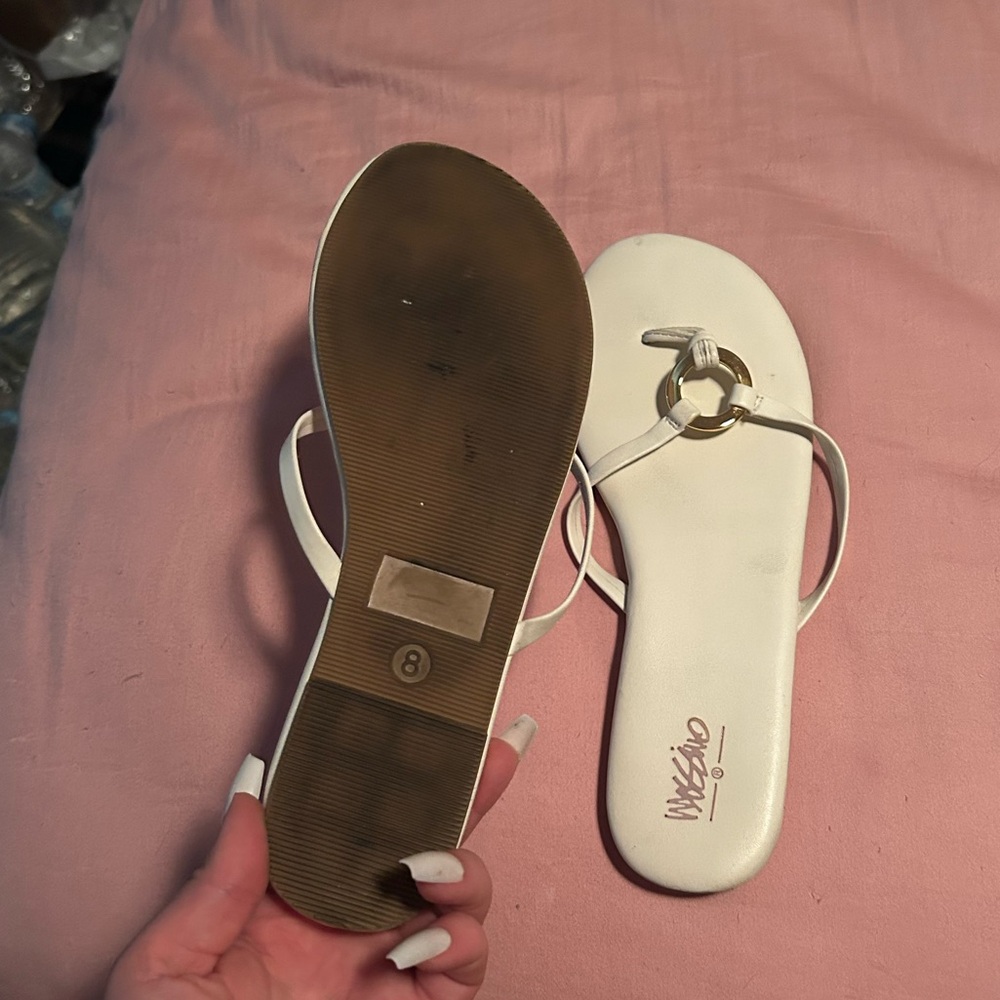 Well worn women’s sandals